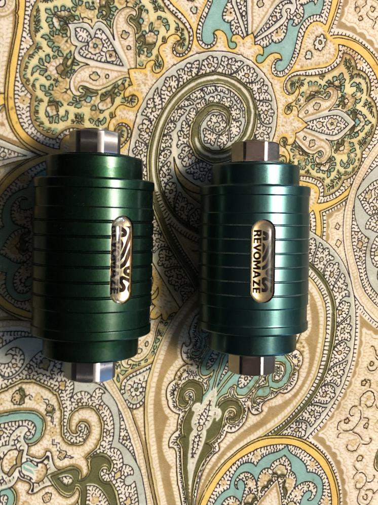 Emerald (the darker one) and the other one is the first run of Green V1